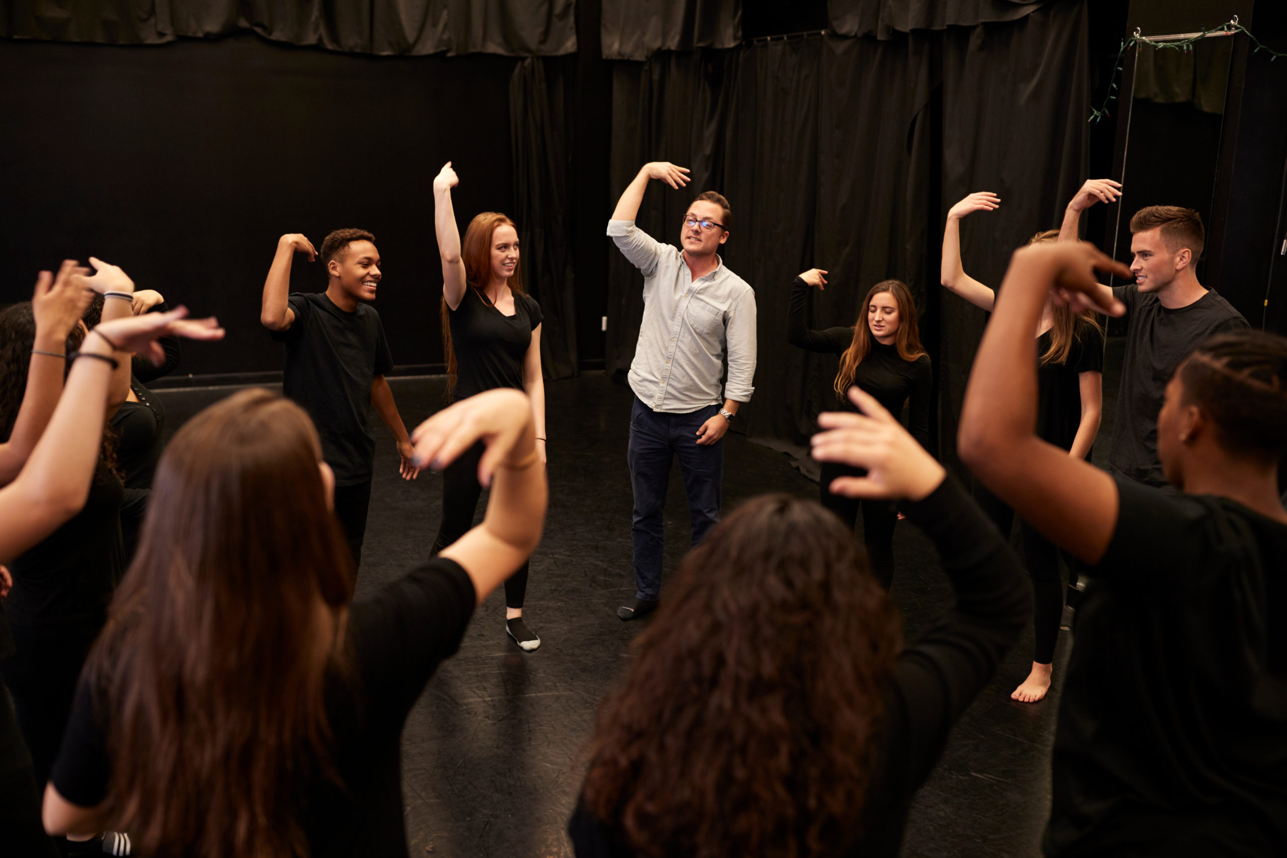 Improv comedy group practicing